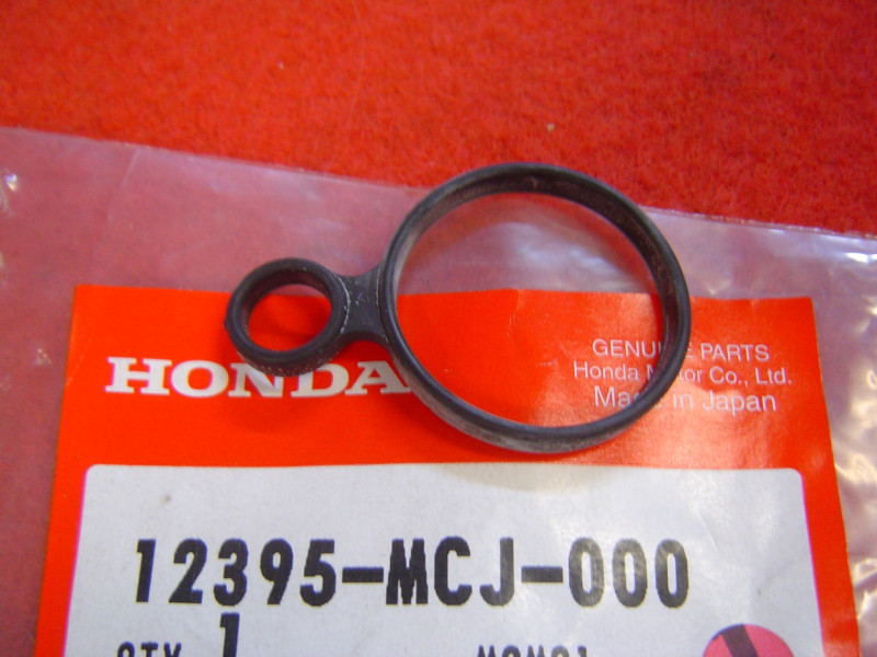 Joint moulé trou de bougie Honda – Réf. 12395MCJ000