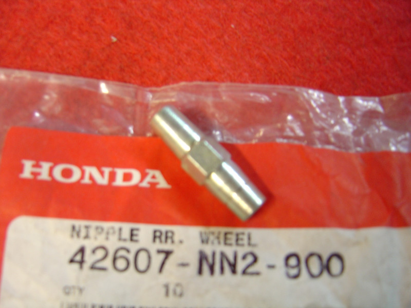 Écrou tension rayons roue AR Honda Cota 315R - Réf. 42607NN2900
