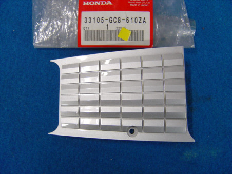 Cache D montage phare couleur NH35M de NH80M Lead 93/94 HONDA 33105-GC8-610ZA