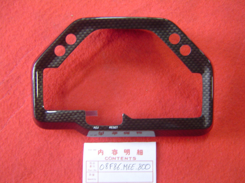 Entourage compteurs look carbone pour CBR600RR 05