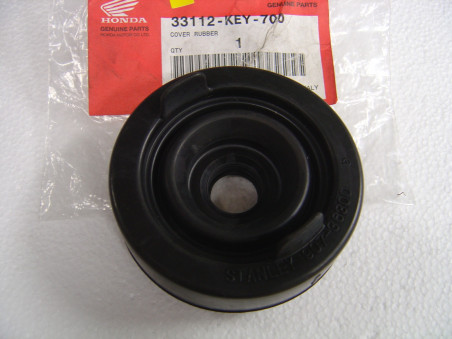 Caoutchouc montage phare Honda FES125 2000 - 33112-KEY-700