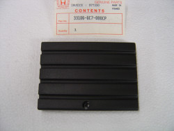 Cache plastique gauche phare Honda NH50MC - Réf. 33106GC7000CP