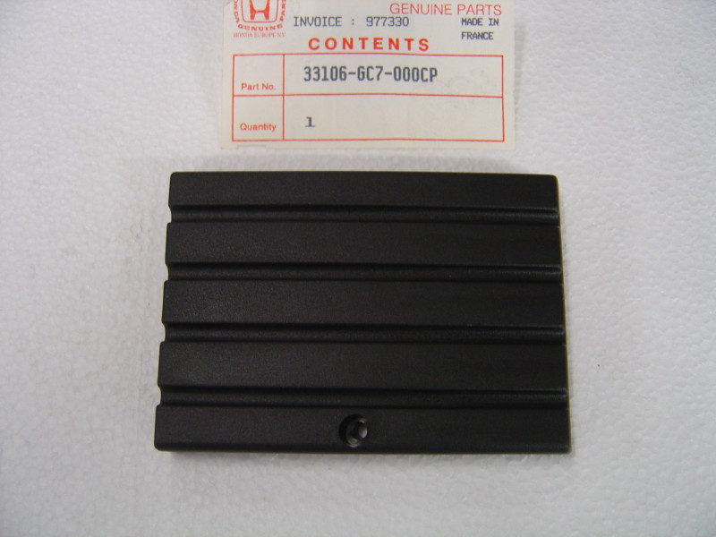 Cache plastique gauche phare Honda NH50MC - Réf. 33106GC7000CP