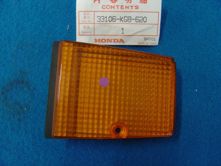 Cache AV gauche orange Honda CH125 NH125 83 - Réf. 33106KG8620