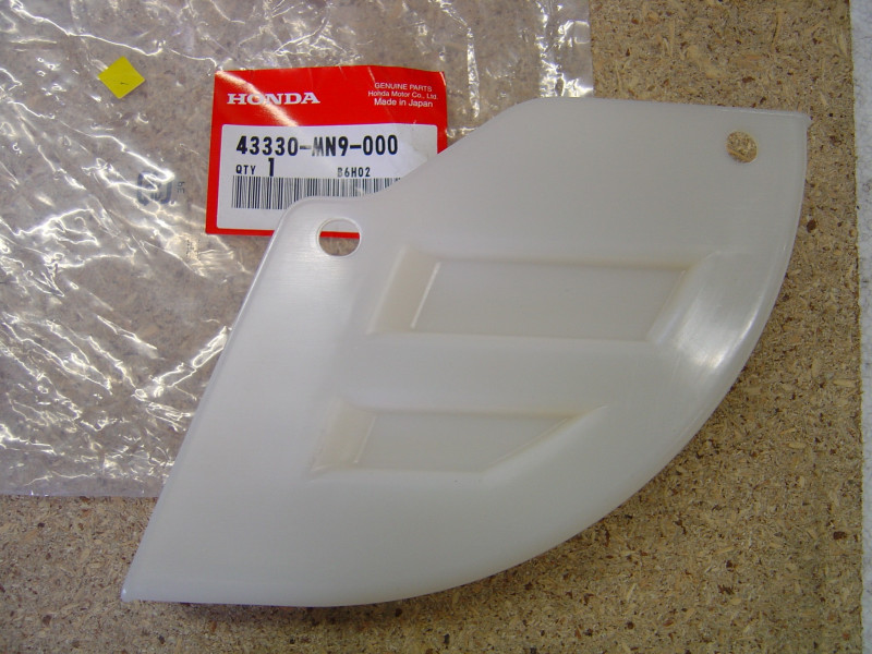 Cache frein arrière Honda NX650 - Réf. 43330MN9000