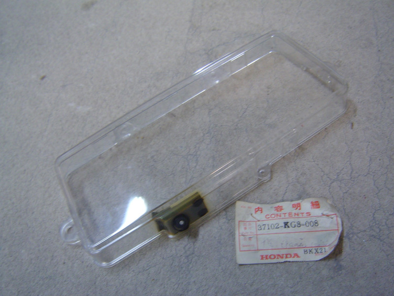 Vitrage Boîtier Compteur Honda NH125D E G - Réf. 37102KG8008