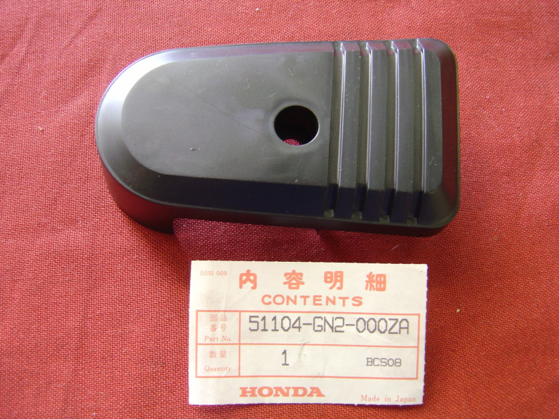 Cache bas de fourche gauche Honda NB50 - Réf. 51104-GN2-000ZA