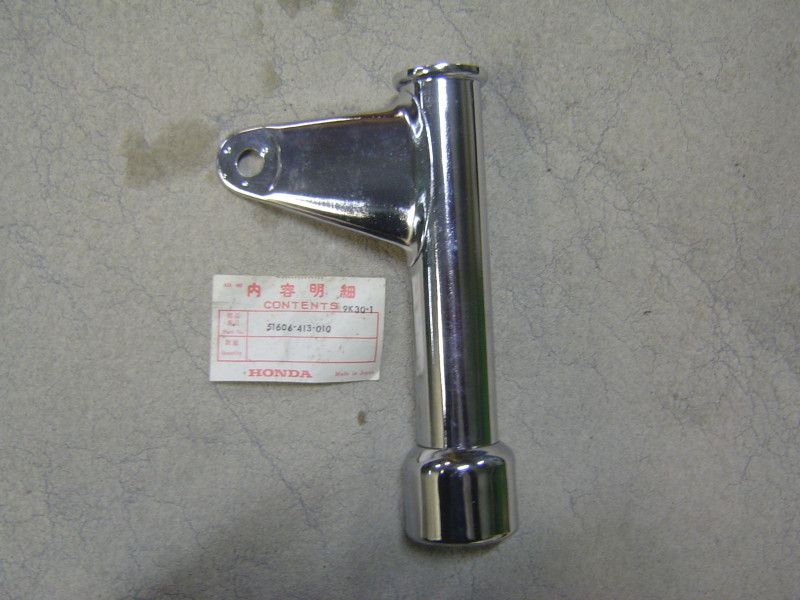 Patte de phare gauche Honda CB250-T CB400-T - Réf. 51606413010