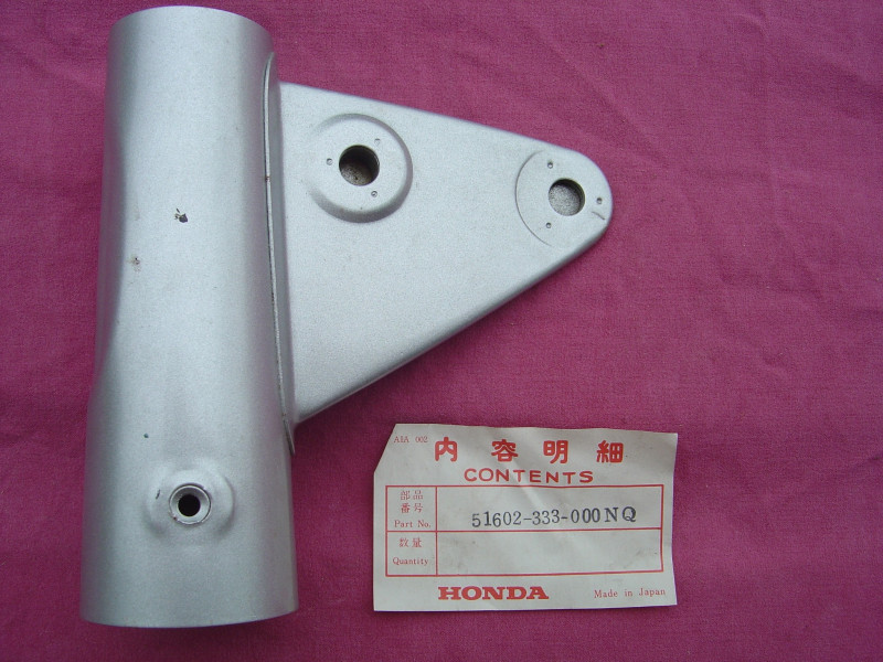 Patte de phare droit gris Honda CB350F - Réf. 51602333000NQ