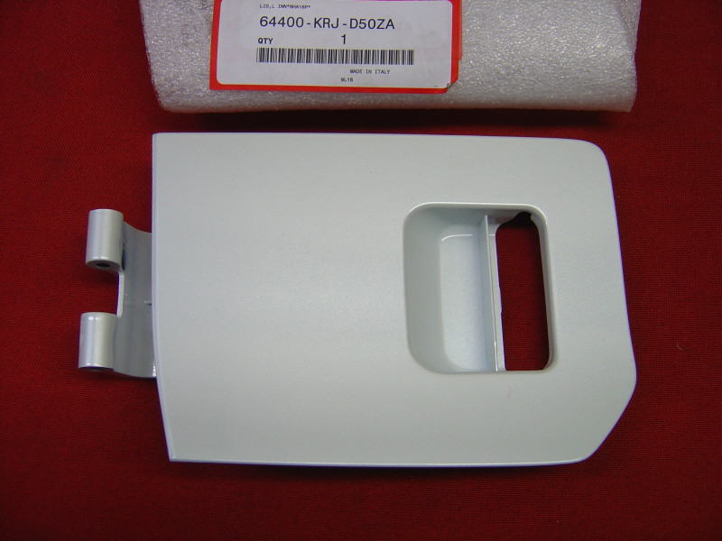 Couvercle vide poche G Honda FES125 09/12 | Réf. 64400KRJD50ZA