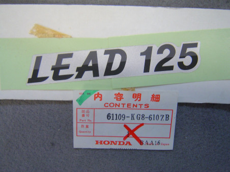 Autocollant Garde-Boue AV Honda NH125D E Type 2 | 61109KG8610ZB