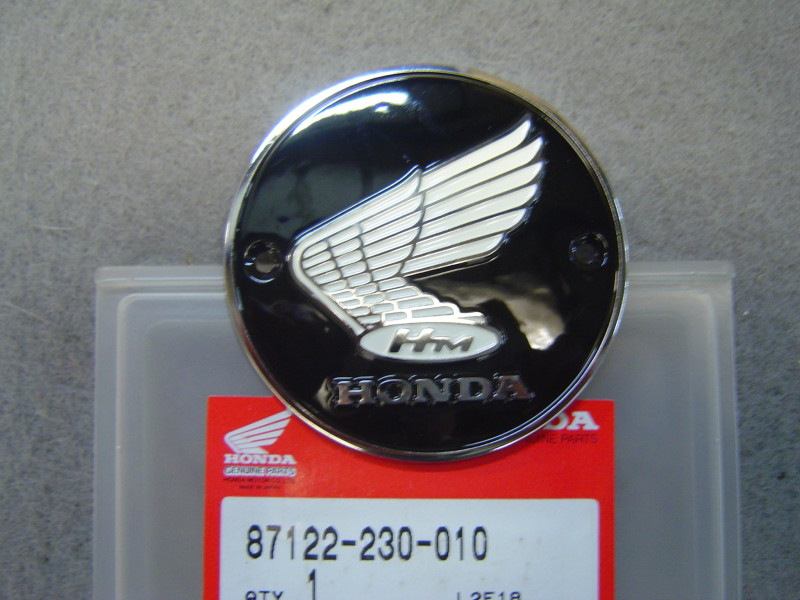 Emblème gauche réservoir Honda 87122-230-010