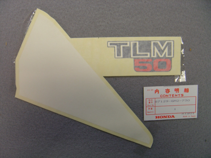 Décor autocollant cache gauche Honda TLM50F 85 - 87129GM2730