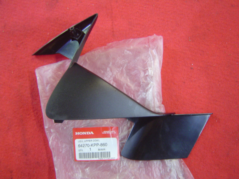 Garniture supérieure gauche tête fourche Honda CBR125 64270-KPP-860