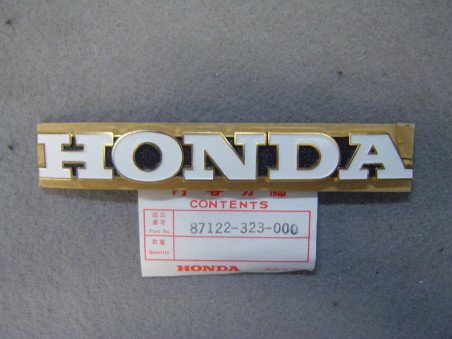 Emblème Réservoir Gauche Honda – Réf. 87122323000