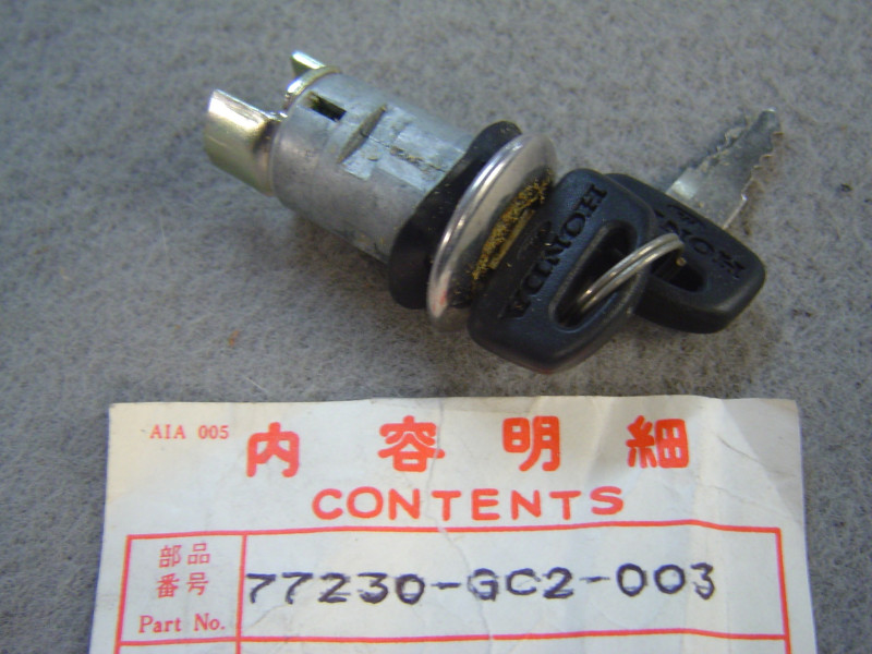Serrure de siège Honda NB50ME - Réf. 77230GC2003
