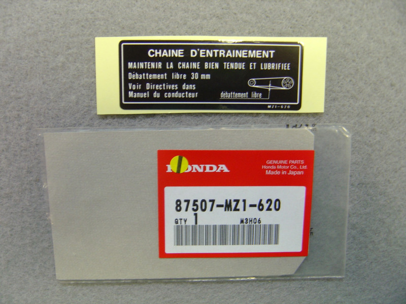 Étiquette sécurité chaîne Honda – Réf. 87507MZ1620