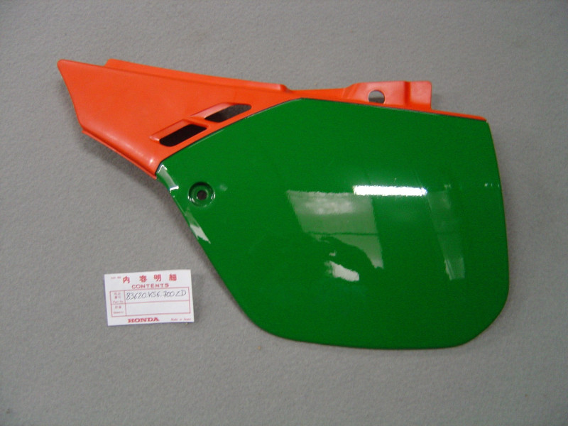 Cache latéral gauche Honda 250CR RH 87 - Réf. 83620KS6700ZD