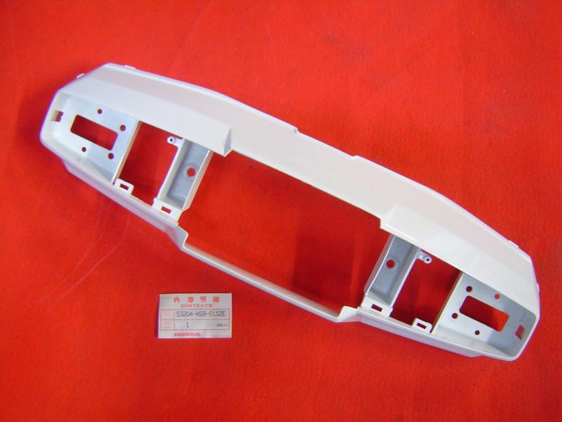 Capotage phare avant Honda NH125 86 NH138 - Réf. 53204KG8610ZE