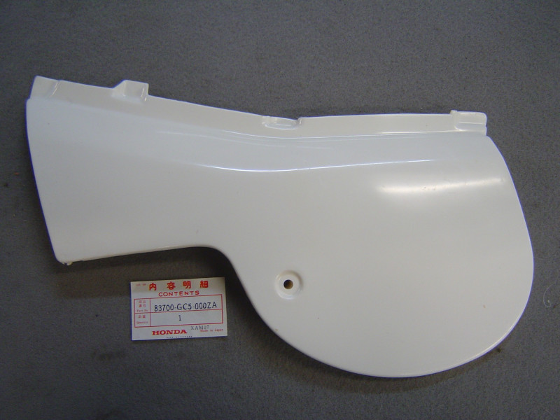 Cache latéral gauche Honda MTX80C MTX50S NH111 occasion