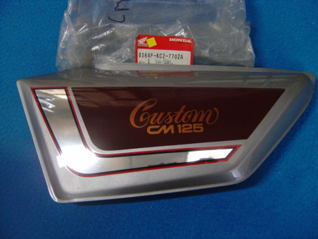 Cache latéral gauche Honda 125cc 1988 - Réf. 8364PKC2770ZA
