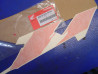 Décor flanc selle droit Honda NSR125 RN 92 - 83513KY4670ZA