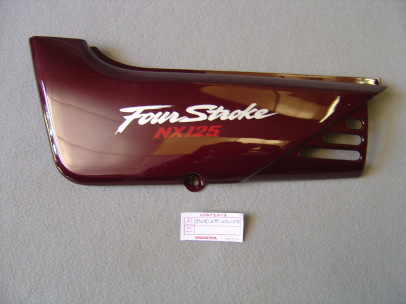 Cache latéral gauche Honda NX125V 97 - Réf. 83610-KAY-W00ZB