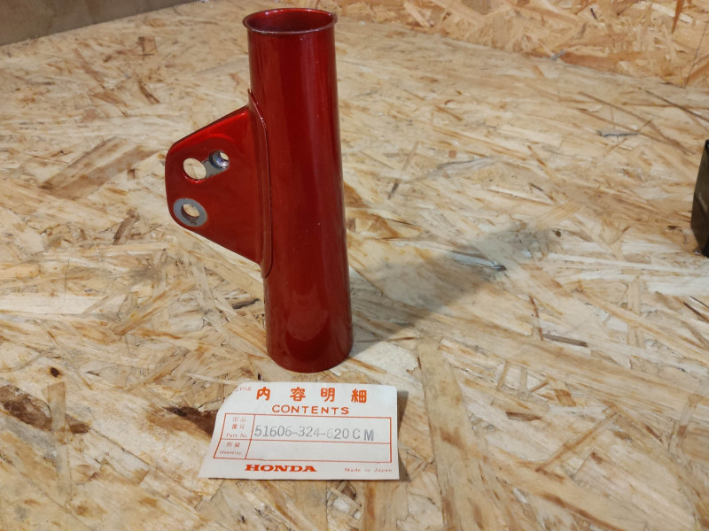 Patte de phare gauche Honda CB125S - Réf. 51606-324-620CM