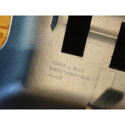 Cache latéral gauche Honda VT125C 06-07 Gris NHA49M