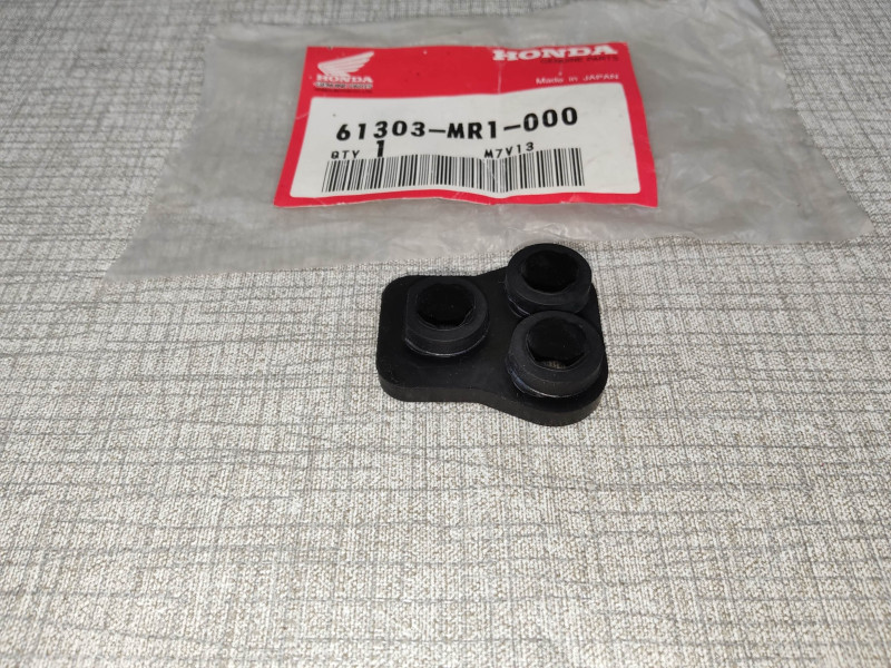 Caoutchouc de montage Honda 61303-MR1-000 | Pièce neuve