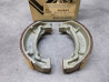 Jeu de machoires de frein TS125 TS50 RV90 SUZUKI 54401-35880
