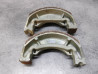 Jeu de machoires de frein TS125 TS50 RV90 SUZUKI 54401-35880