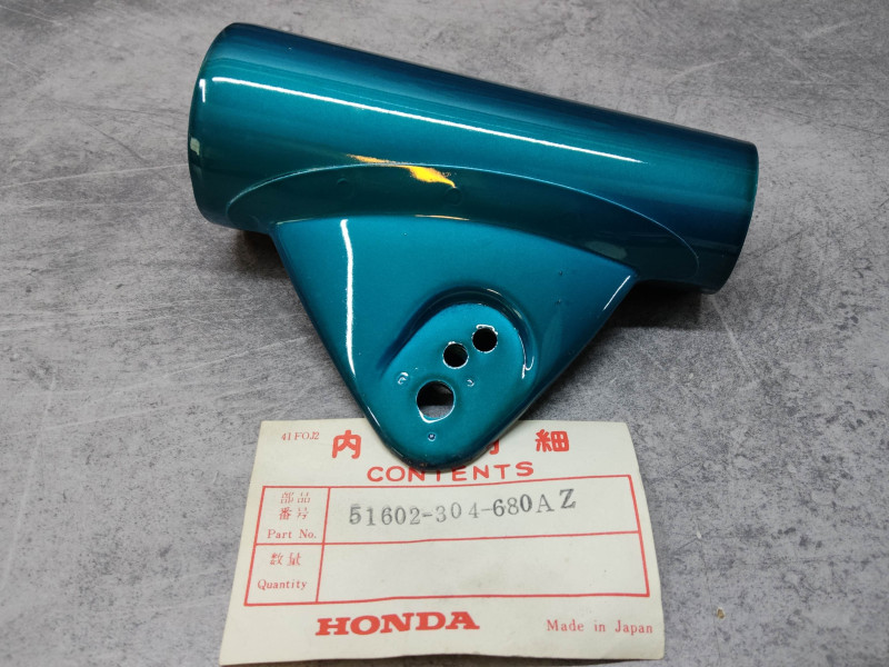 Patte de phare droite bleue CB125K3 HONDA 51602-304-680AZ