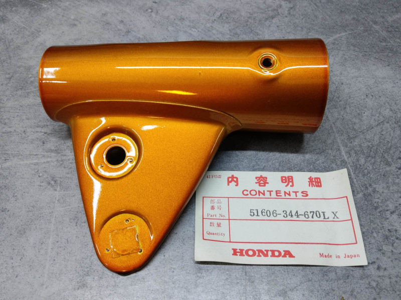 Patte de phare couleur gold coté gauche CB250K4 HONDA 350K4 51606-344-670LX