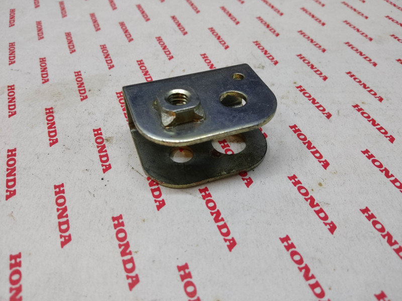 Support gauche clignotant CM125T 1981 HONDA 33605-424-720
