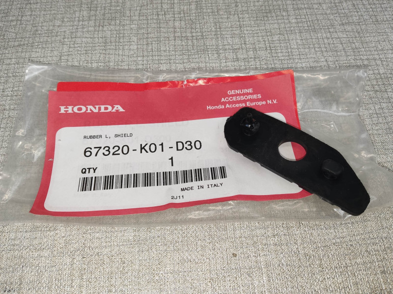 Pièce caoutchouc gauche Honda 67320-K01-D30