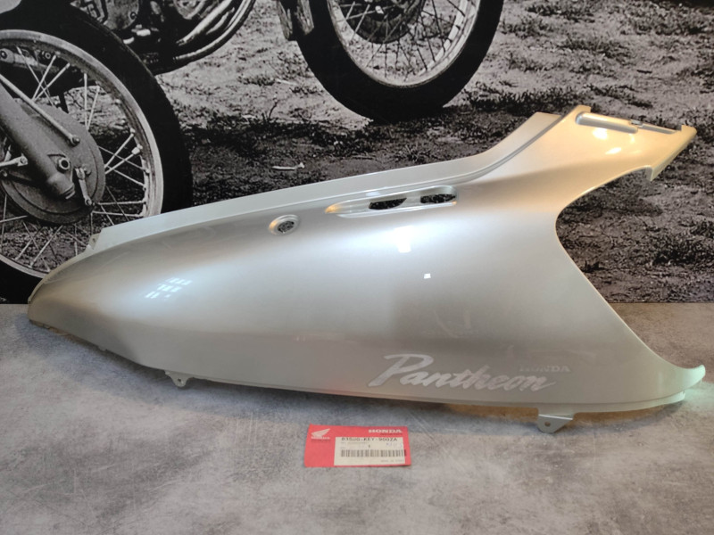 Cache latéral gauche gris NOS FES125 PANTHEON HONDA 83500-KEY-900ZANOS