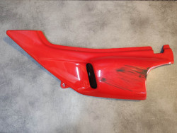 Cache latéral gauche rouge OCCASION NX 650 DOMINATOR HONDA 83600-MAN-600ZCOCC