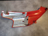 Cache latéral gauche rouge OCCASION NX 650 DOMINATOR HONDA 83600-MAN-600ZCOCC