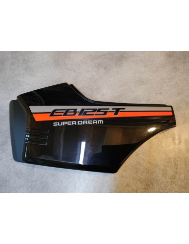 Cache latéral gauche noir (R109) CB125T 1990 NOS HONDA 83640-KC1-000ZCNOS