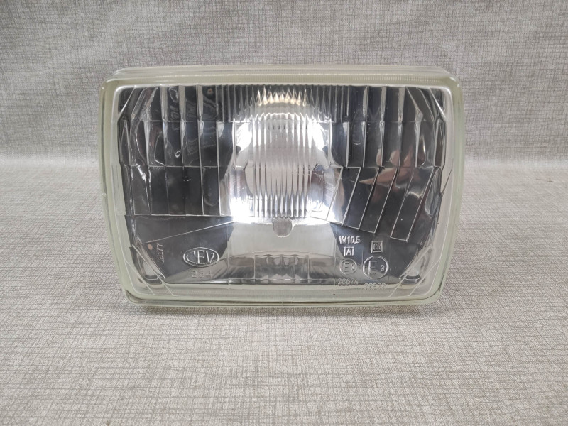 Optique de phare NS125 R R2 1987 neuf HONDA 33120-KR1-860