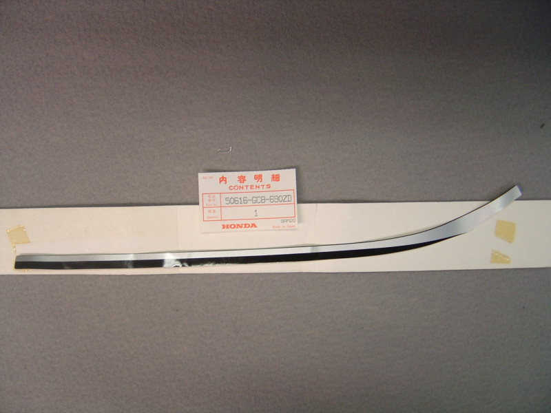 Décor gauche tablier Honda NH80MSG 86 – Réf. 50616GC8690ZD