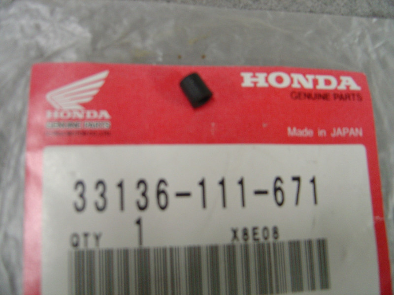 Écrou de phare Honda VT800C CT70 C50 - Réf. 33136-111-671