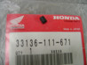Écrou de phare Honda VT800C CT70 C50 - Réf. 33136-111-671