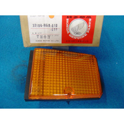 Cache AV gauche orange Honda CH125 NH125 83 - Réf. 33106KG8610